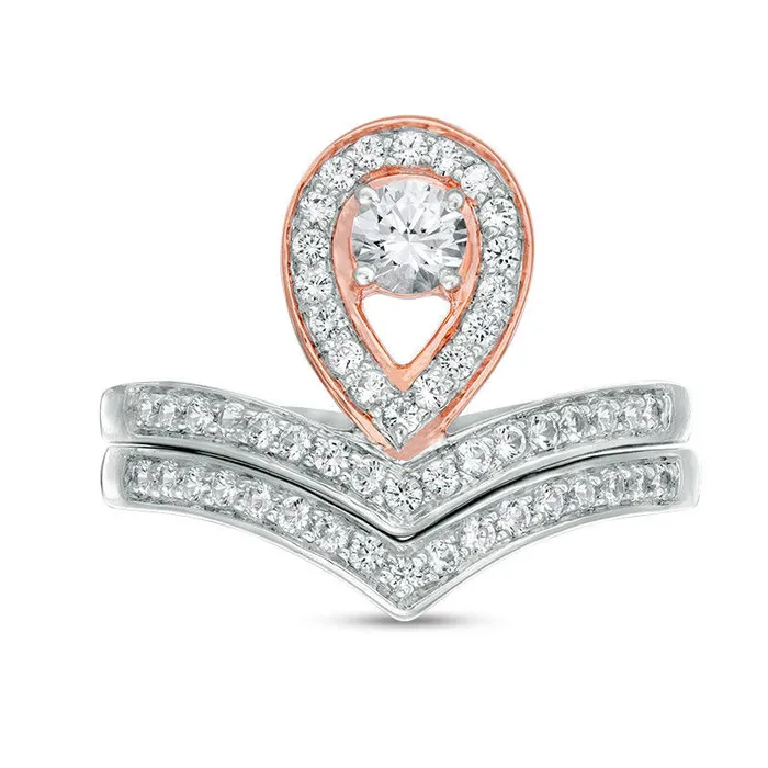 40mm LabCreated White Sapphire PearShaped Frame Chevron Bridal Engagement Ring Set in Sterling Silver and Solid 10K Rose Gold Goldia Rings 40mm LabCreated White Sapphire PearShaped Frame Chevron Bridal Engagement Ring Set in Sterling Silver and Solid 10K Rose Gold Goldia Rings