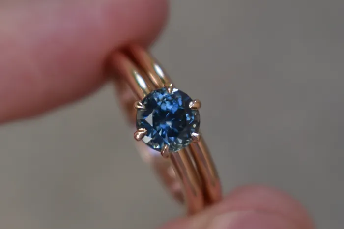 Teal Blue Montana Sapphire Solitaire Engagement Ring Set 14K Rose Gold Albrecht Jewellery Rings Teal Blue Montana Sapphire Solitaire Engagement Ring Set 14K Rose Gold Albrecht Jewellery Rings